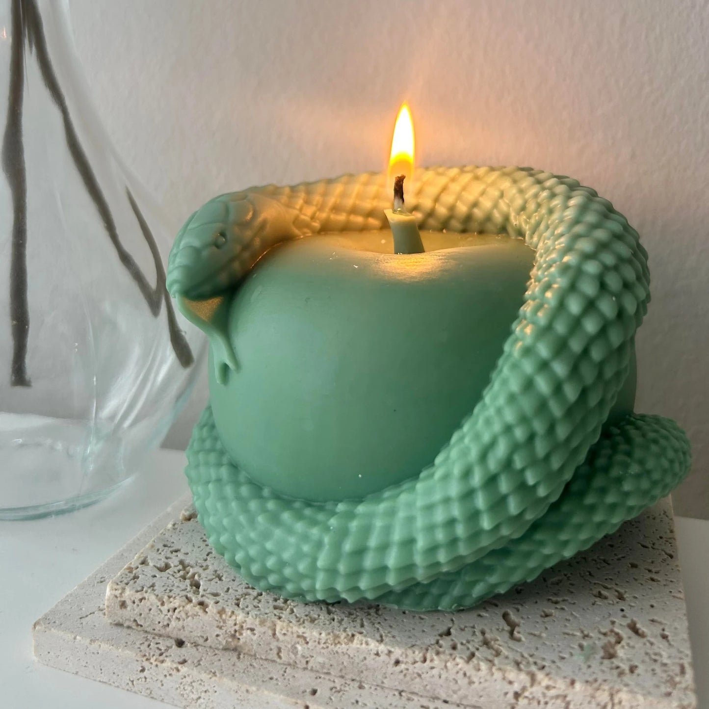 The apple snake candle